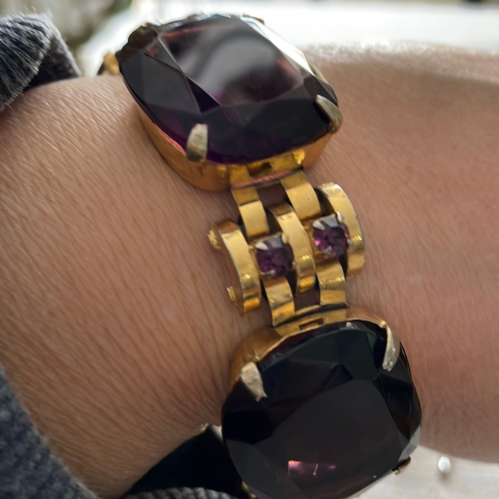 This is a beautiful antique bracelet the stone are glass purple